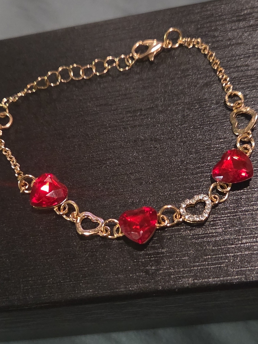 Gold-Tone Bracelet with Red Heart Stones